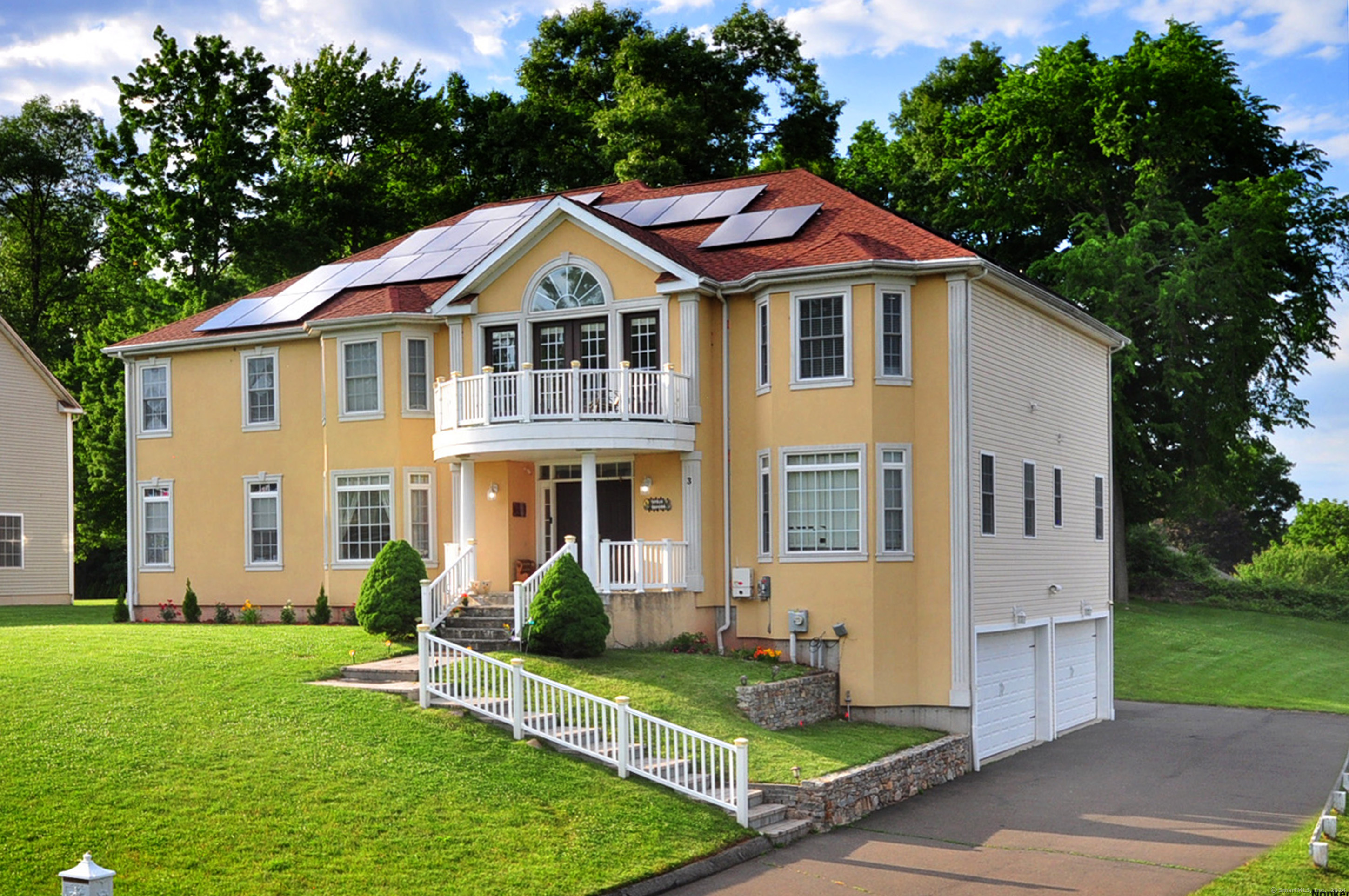 3 Maplecrest Lane Hamden, CT 06514 - Photo 2 of 40 a front view of a house with a yard and porch