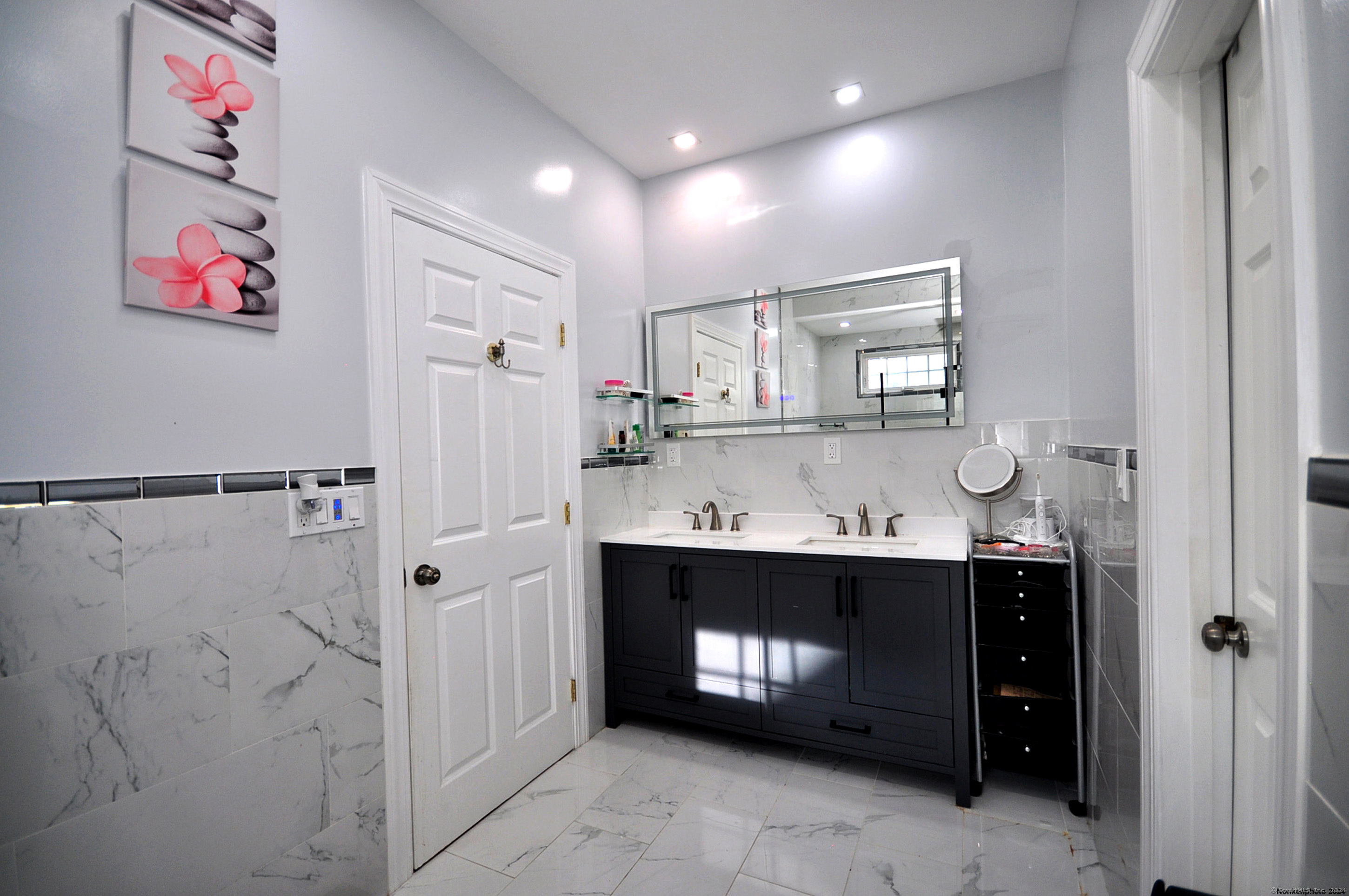 3 Maplecrest Lane Hamden, CT 06514 - Photo 23 of 40 a room with fireplace and cabinets