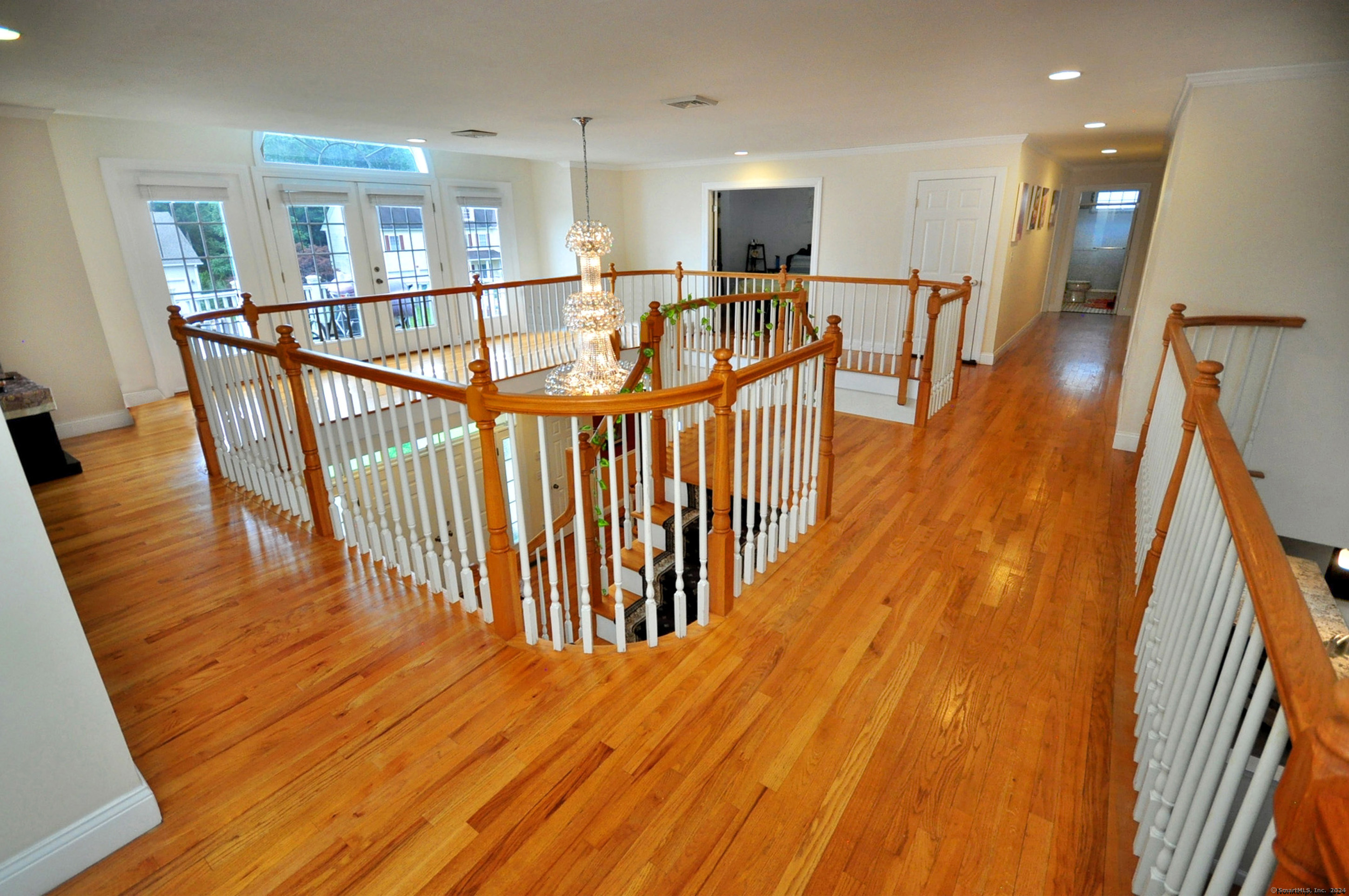 3 Maplecrest Lane Hamden, CT 06514 - Photo 24 of 40 a view of entryway with wooden floor