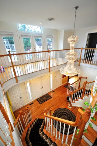 a view of an chairs and table in the balcony