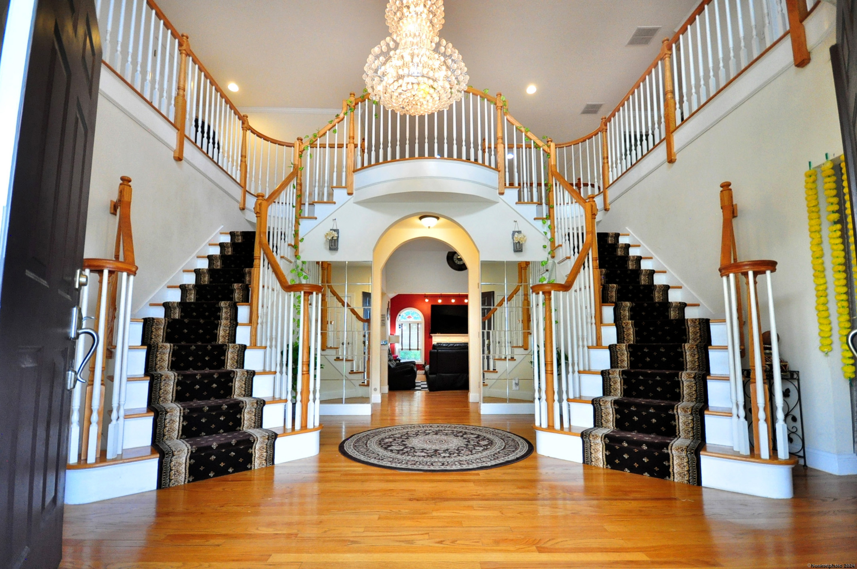 3 Maplecrest Lane Hamden, CT 06514 - Photo 5 of 40 a living room with fireplace furniture and a wooden floor