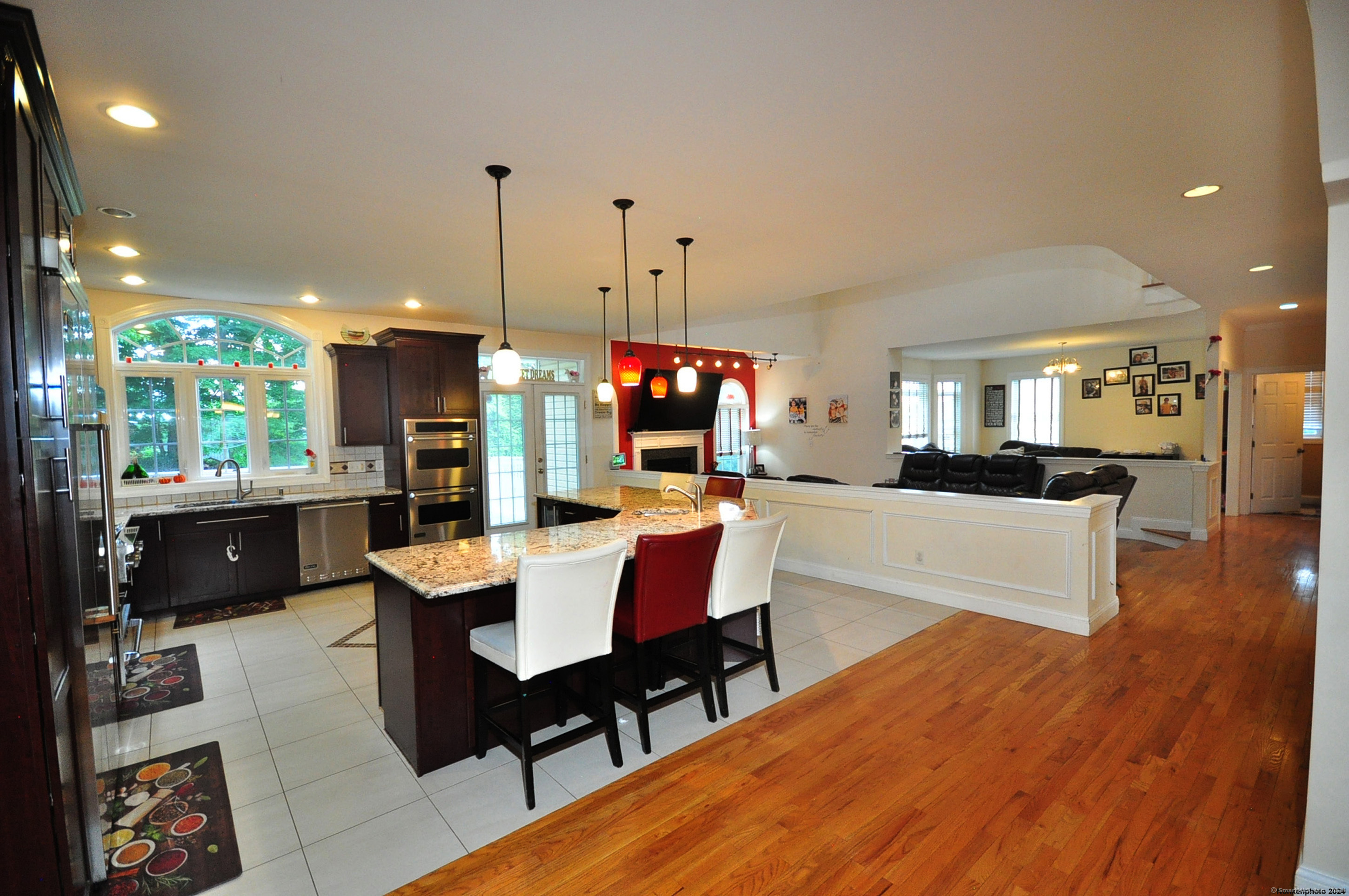 3 Maplecrest Lane Hamden, CT 06514 - Photo 9 of 40 a view of a dining room kitchen with furniture and wooden floor