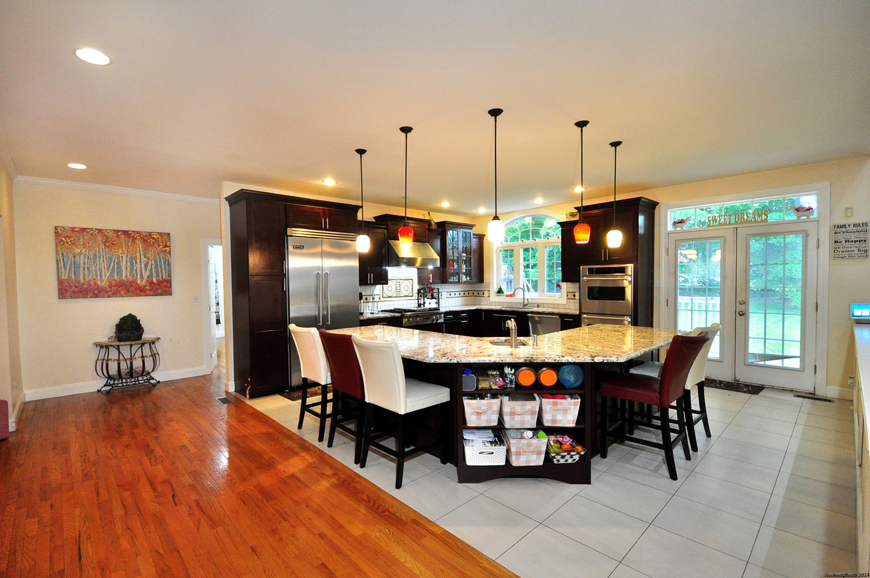 3 Maplecrest Lane Hamden, CT 06514 - Photo 10 of 40 a view of a dining room with furniture window and wooden floor
