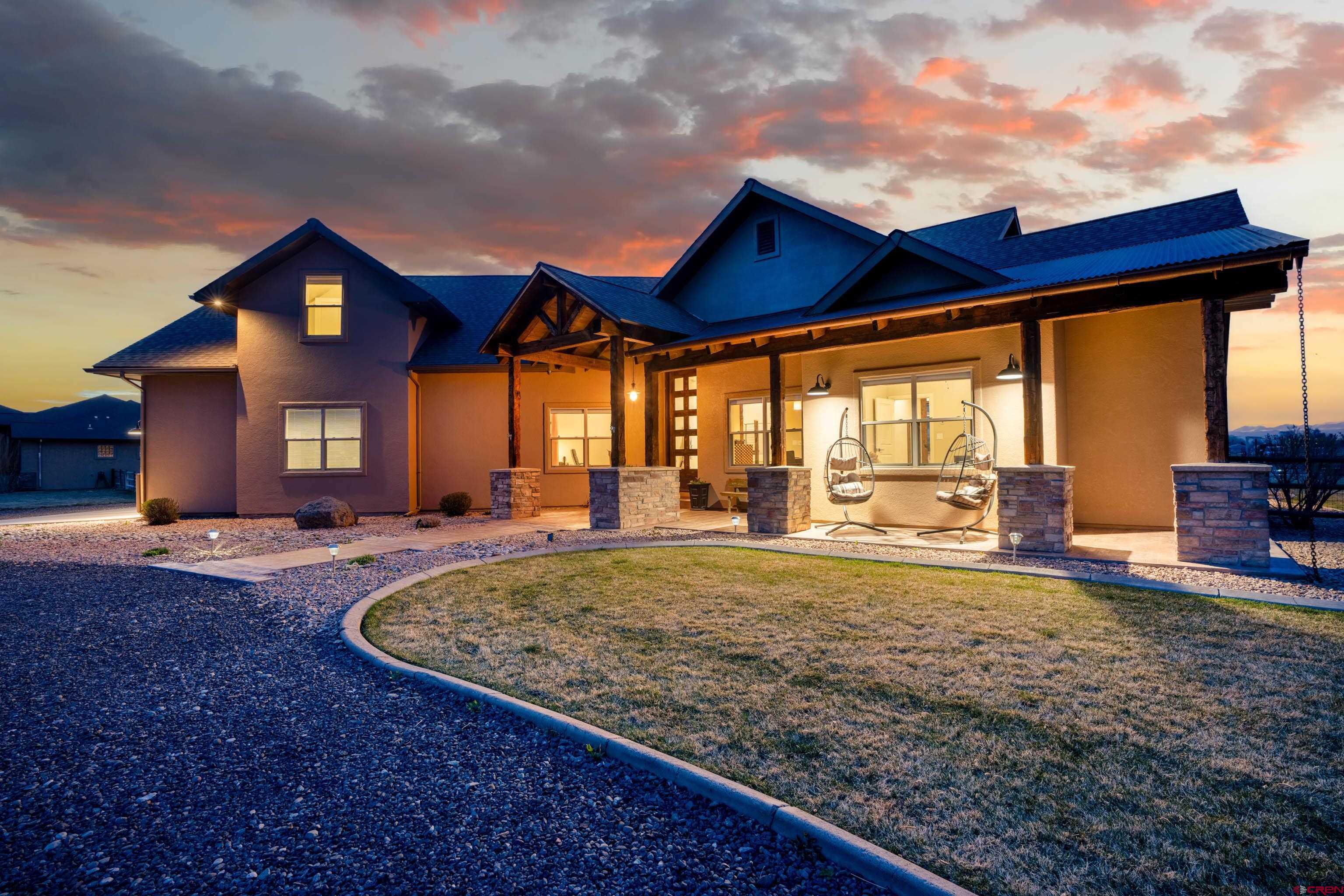1988 J Road Fruita, CO 81521 - Photo 34 of 35 a view of a house with backyard and porch