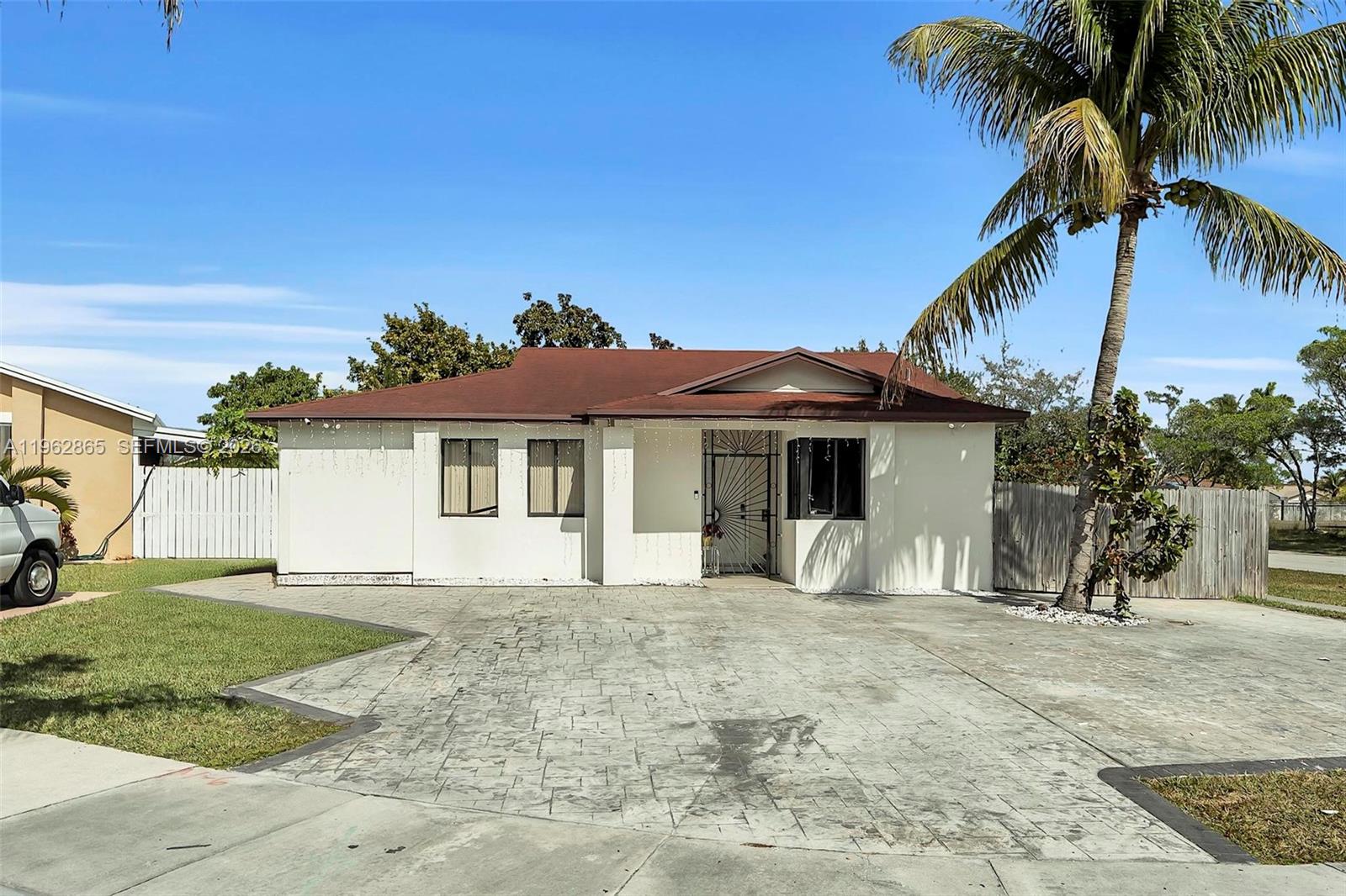 a view of a yard in front of a house with a yard