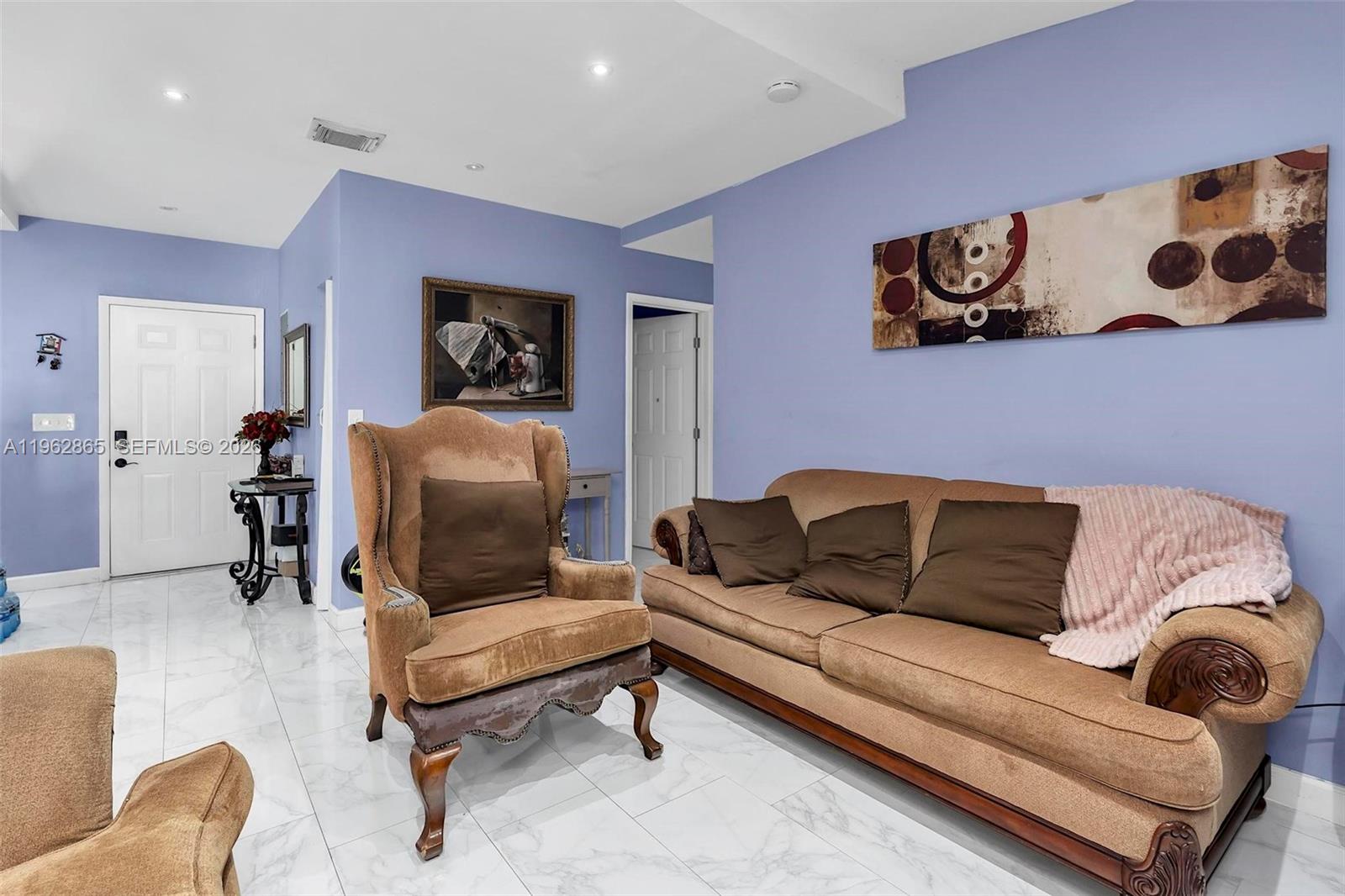 12201 Southwest 194th Terrace Miami, FL 33177 - Photo 15 of 34 a living room with furniture and wooden floor