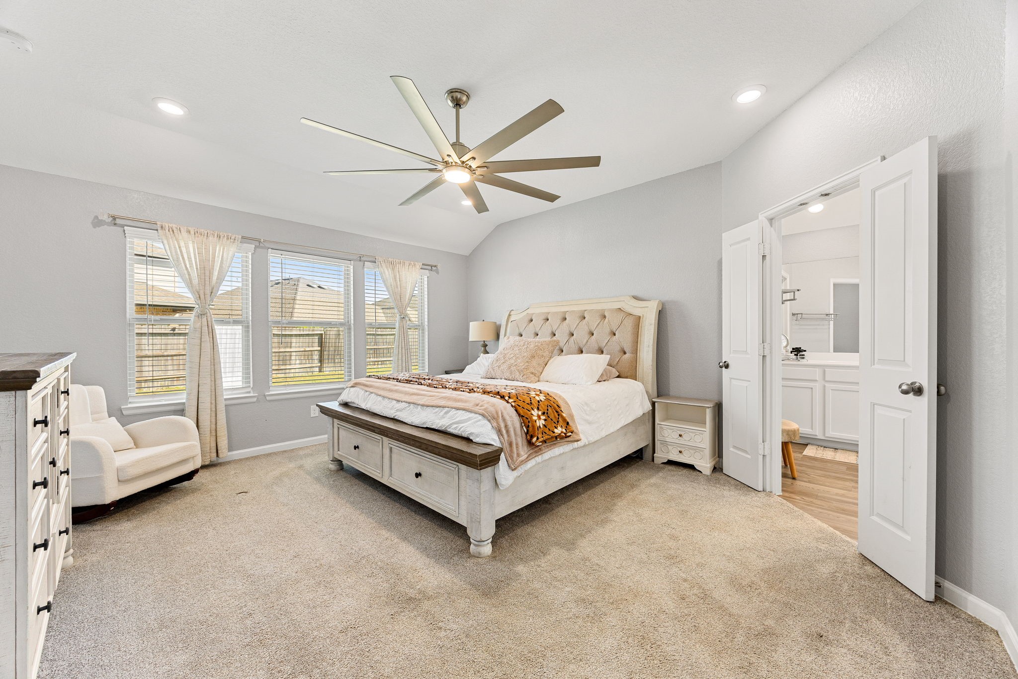 23002 Blackstone Park Road Katy, TX 77493 - Photo 17 of 36 a bed room with a bed and a window