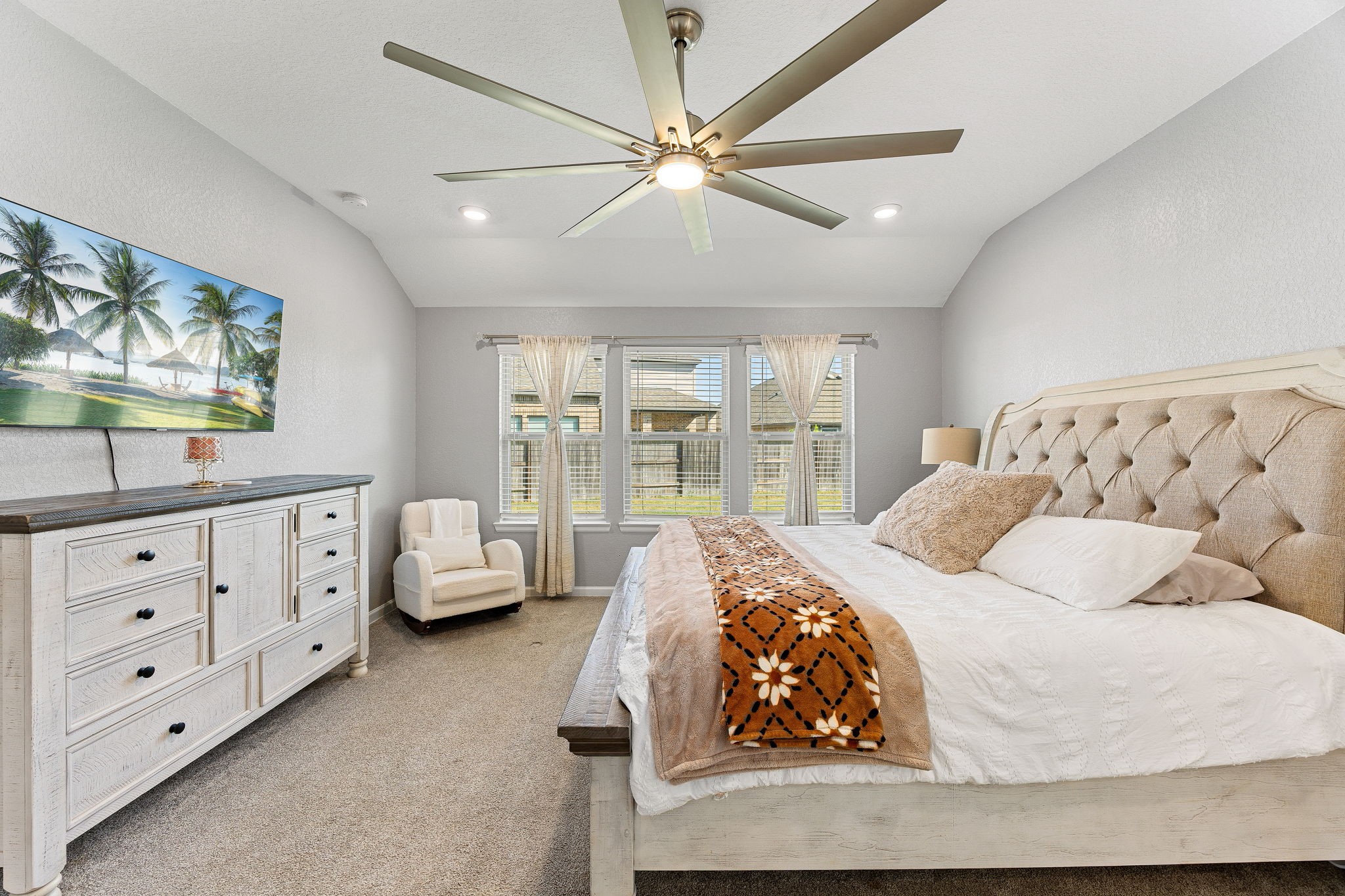 23002 Blackstone Park Road Katy, TX 77493 - Photo 18 of 36 a bedroom with a bed and window