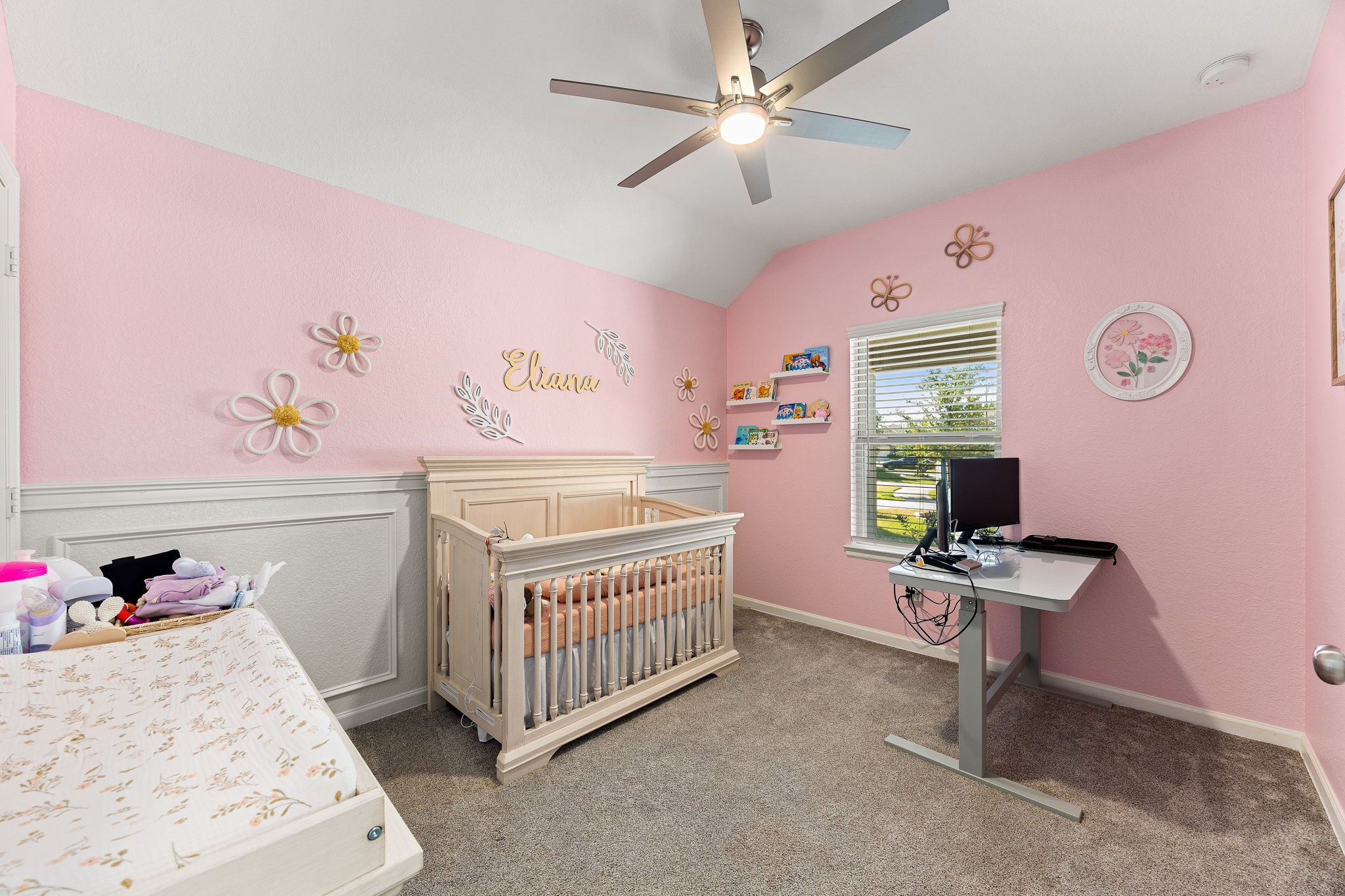 23002 Blackstone Park Road Katy, TX 77493 - Photo 22 of 36 a room with a baby bed dresser and a window