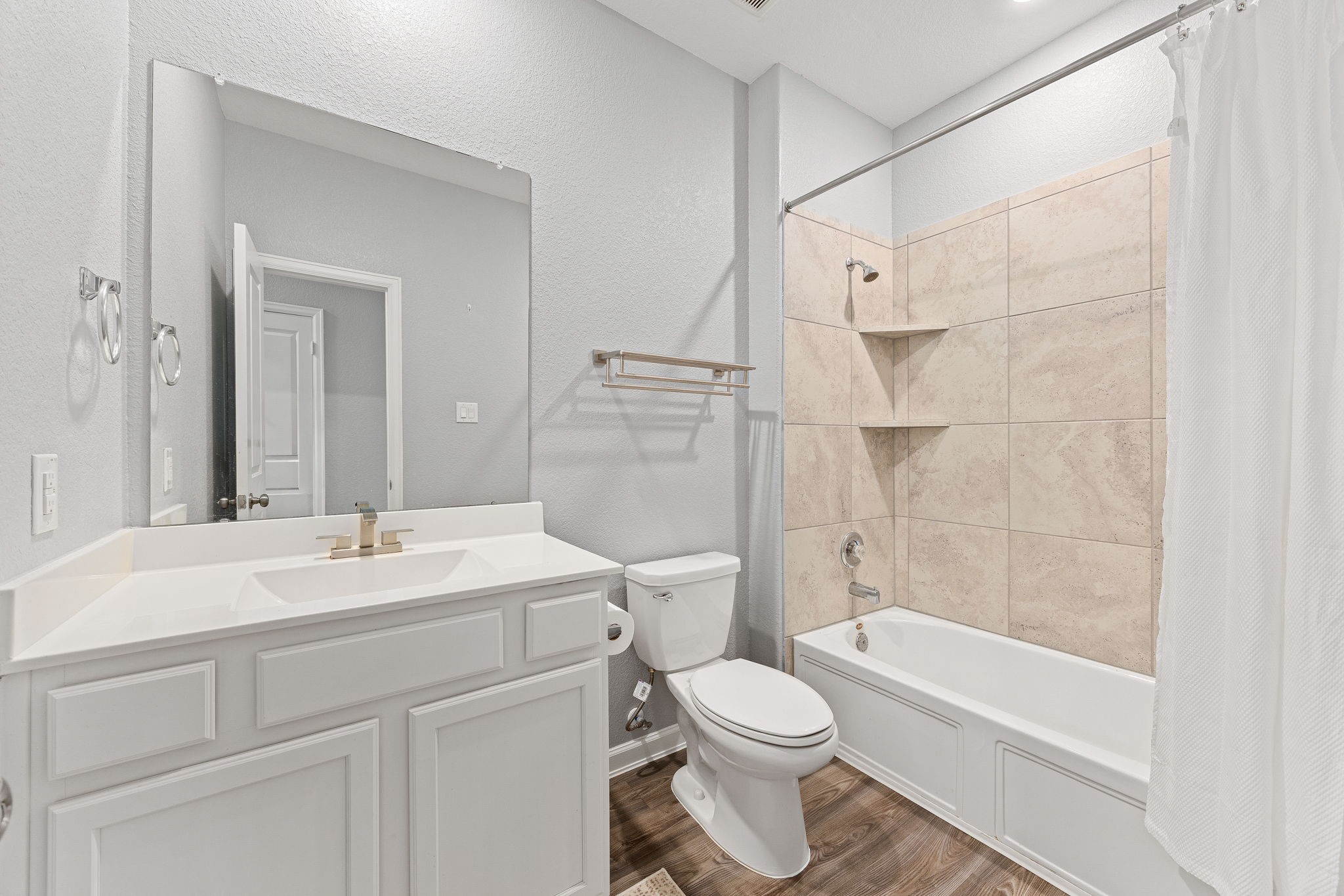 23002 Blackstone Park Road Katy, TX 77493 - Photo 25 of 36 a bathroom with a sink a toilet and shower