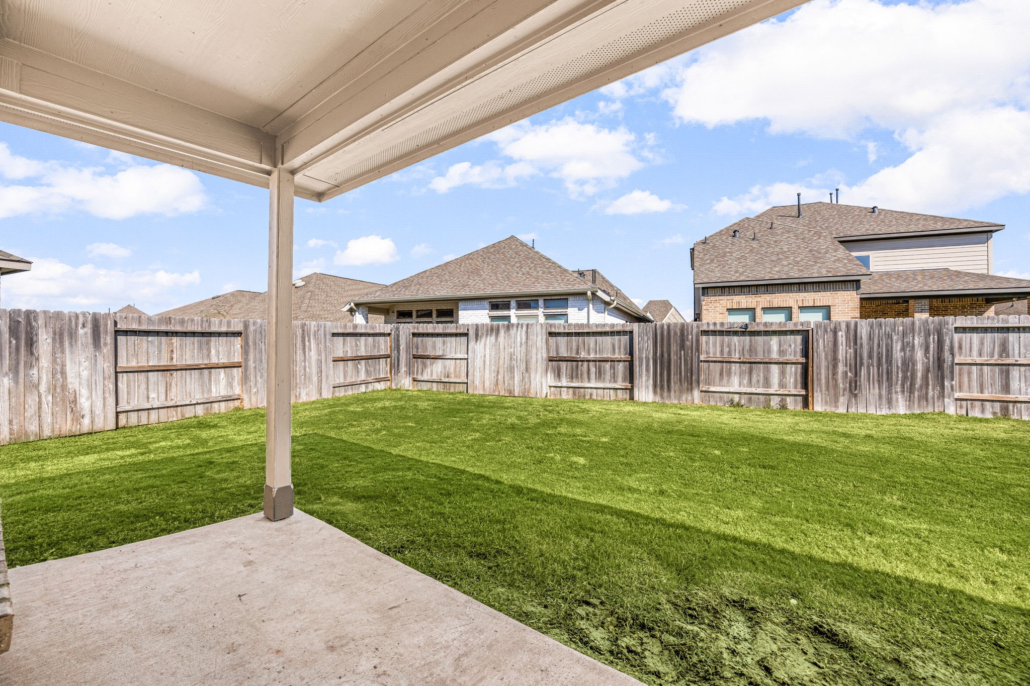23002 Blackstone Park Road Katy, TX 77493 - Photo 27 of 36 a view of a house with backyard porch and garden