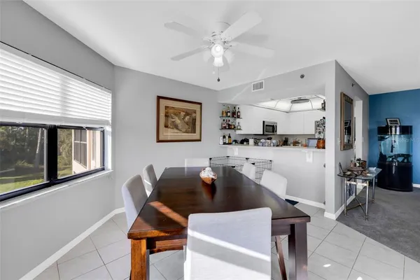 a bathroom with a shower and a bath tub