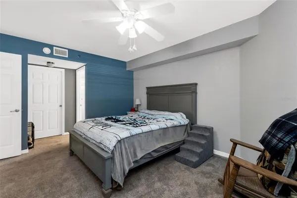 a view of a balcony with furniture