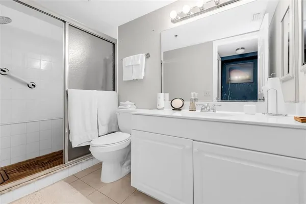 a view of a balcony with furniture