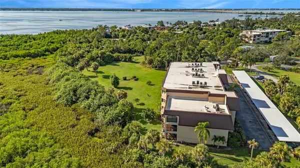 a view of a house with garden and plants