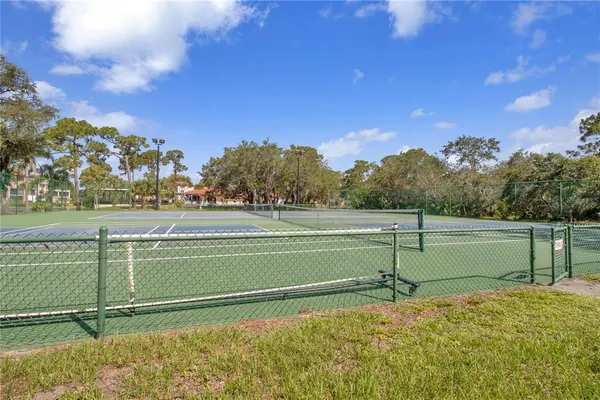 a view of wooden floor and a bridge