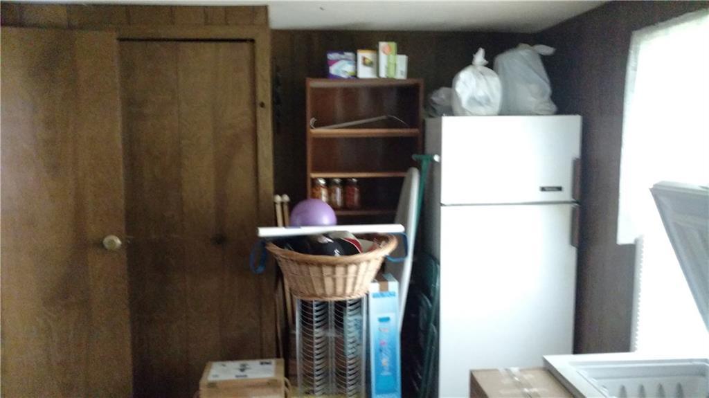 89 Intervale Road Temple, ME 04984 - Photo 13 of 24 This is a bedroom which has an arch...
