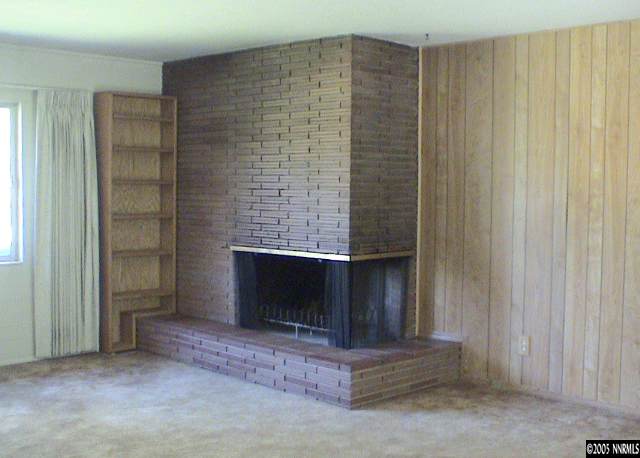 1355 Davidson Way Reno, NV 89509 - Photo 4 of 6 a view of an empty room with a fireplace
