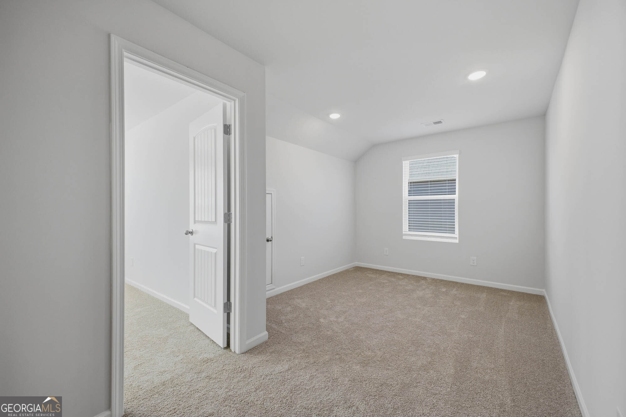 309 Rusty Plow Lane Perry, GA 31069 - Photo 7 of 34 a view of an empty room with a window