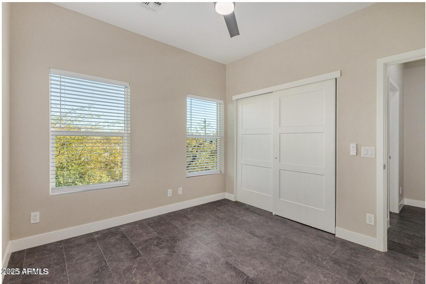 1305 East Madison Street, Unit 4 Phoenix, AZ 85034 - Photo 7 of 14 a view of an empty room with a window