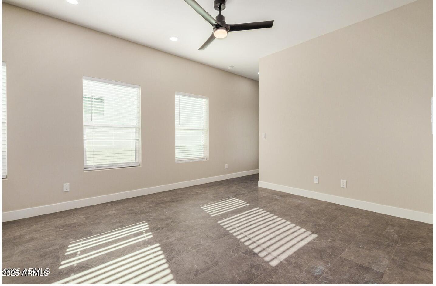 1305 East Madison Street, Unit 4 Phoenix, AZ 85034 - Photo 8 of 14 a view of an empty room with a window