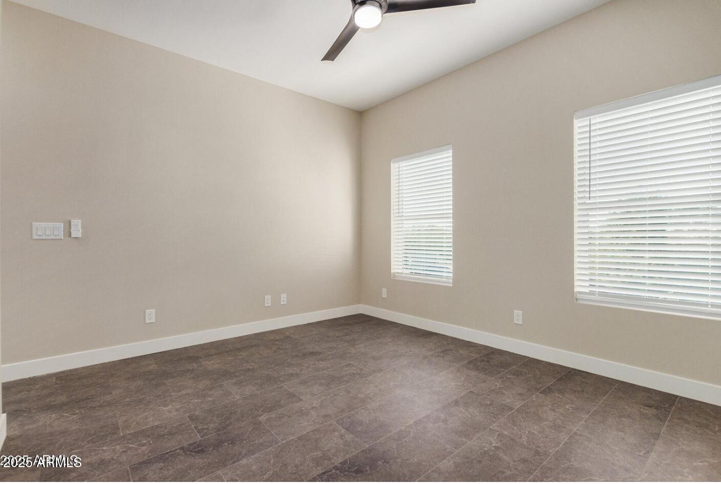 1305 East Madison Street, Unit 4 Phoenix, AZ 85034 - Photo 9 of 14 an empty room with a window