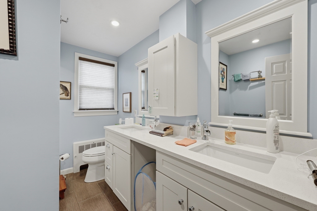 24-26 Watt Road Worcester, MA 01606 - Photo 28 of 41 a bathroom with a sink and a mirror