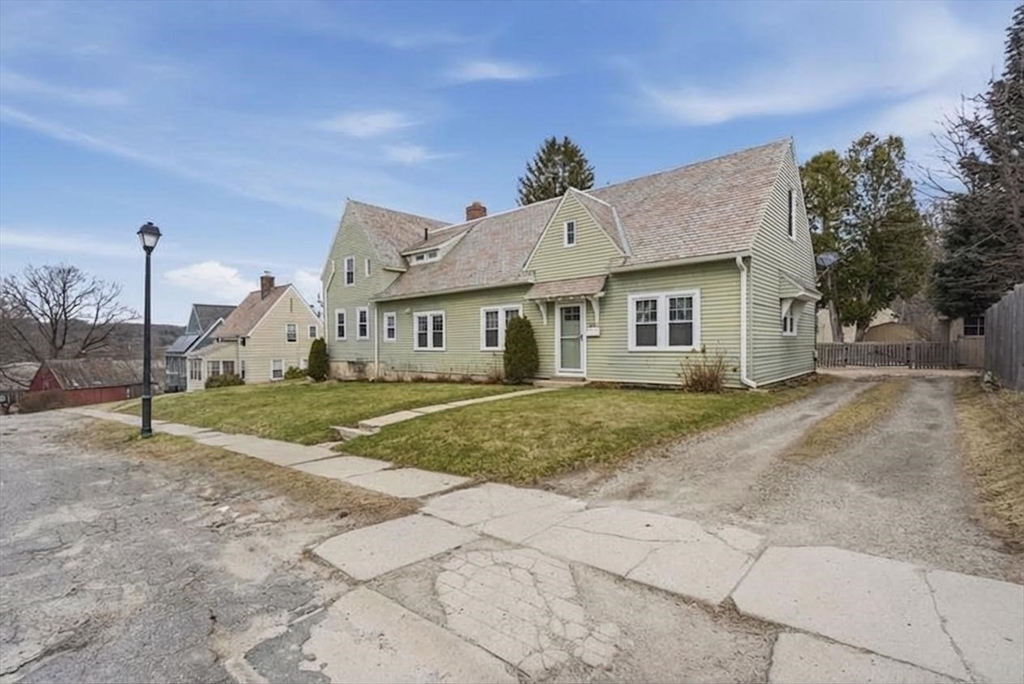 24-26 Watt Road Worcester, MA 01606 - Photo 3 of 41 a view of a house with a yard
