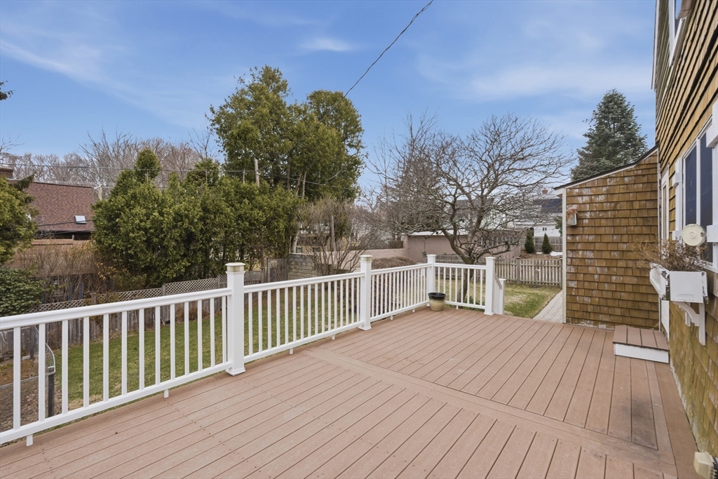 24-26 Watt Road Worcester, MA 01606 - Photo 33 of 41 a view of a balcony with wooden floor and fence