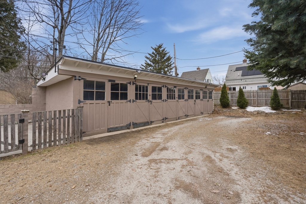 24-26 Watt Road Worcester, MA 01606 - Photo 35 of 41 a view of a house with a yard
