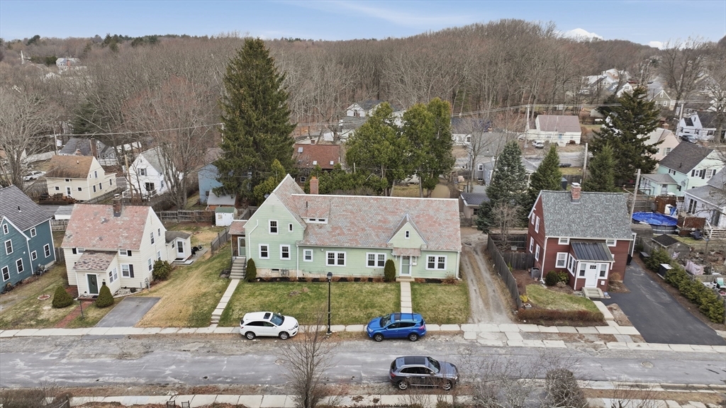 24-26 Watt Road Worcester, MA 01606 - Photo 40 of 41 an aerial view of a house with a garden and mountain view