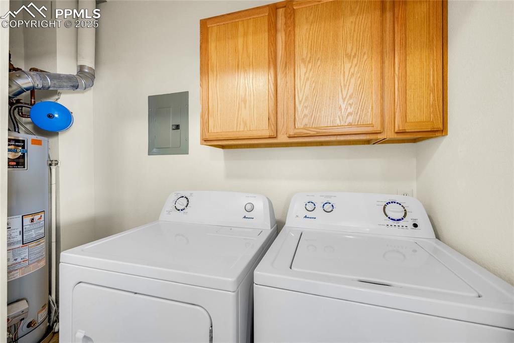 3765 Hartsock Lane, Unit 307 Colorado Springs, CO 80917 - Photo 11 of 37 a view of storage and utility room with washer and dryer