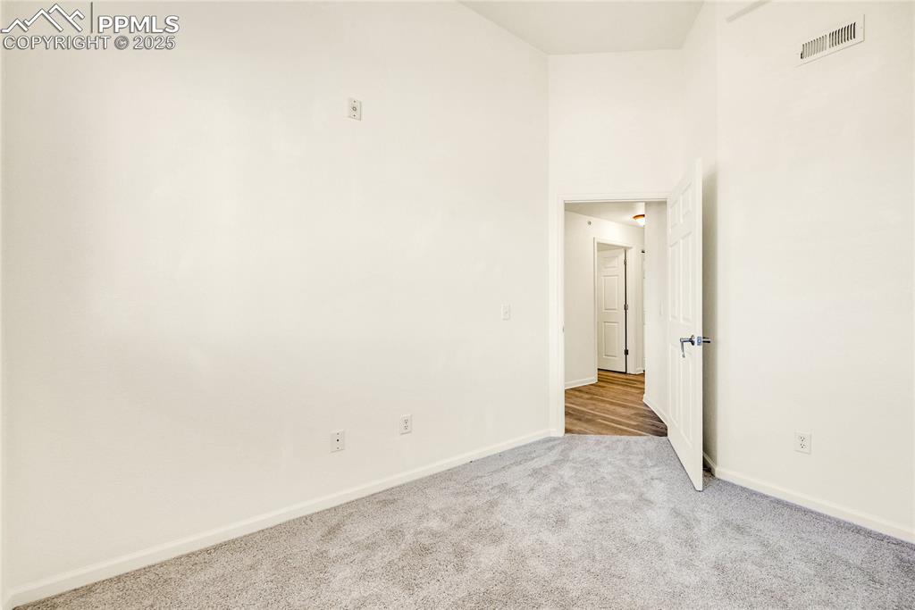 3765 Hartsock Lane, Unit 307 Colorado Springs, CO 80917 - Photo 24 of 37 a view of a room with stairs