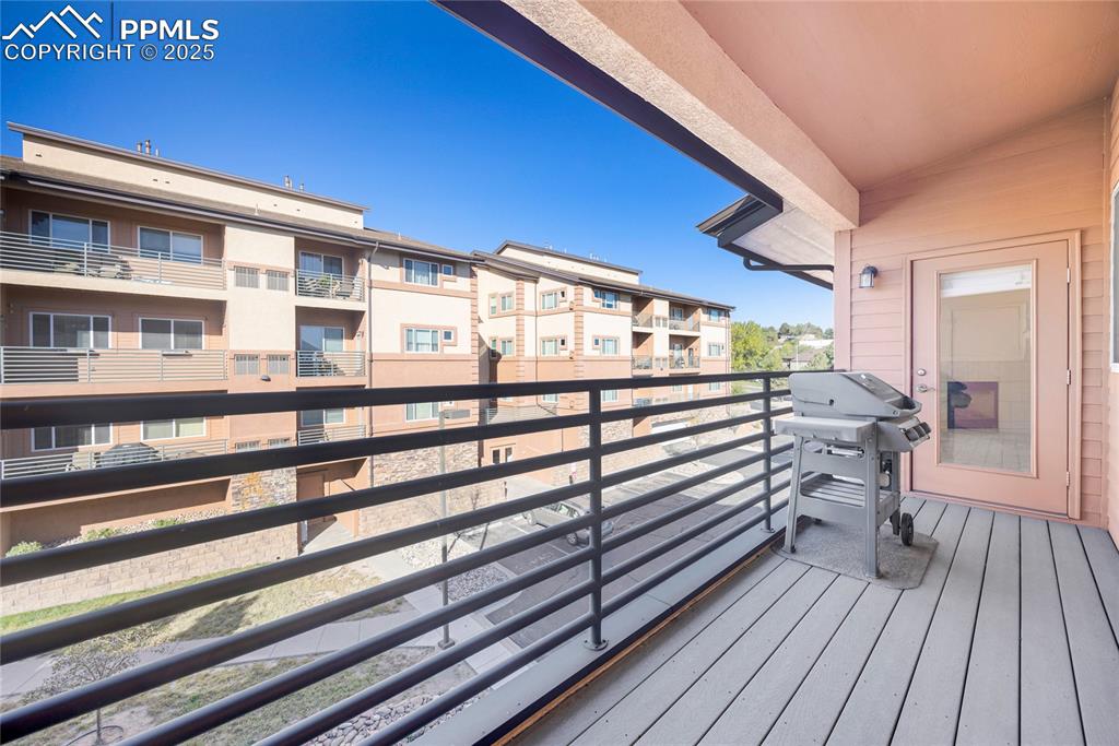 3765 Hartsock Lane, Unit 307 Colorado Springs, CO 80917 - Photo 25 of 37 a view of a building from a balcony