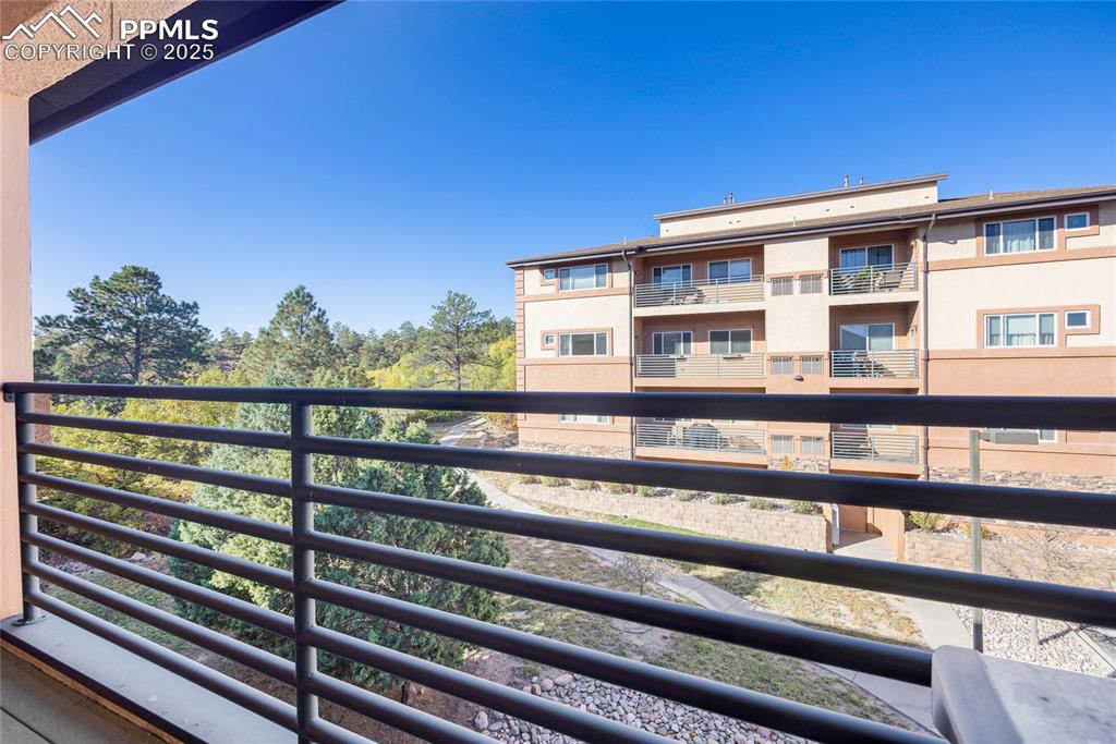 3765 Hartsock Lane, Unit 307 Colorado Springs, CO 80917 - Photo 26 of 37 a view of a building from a balcony