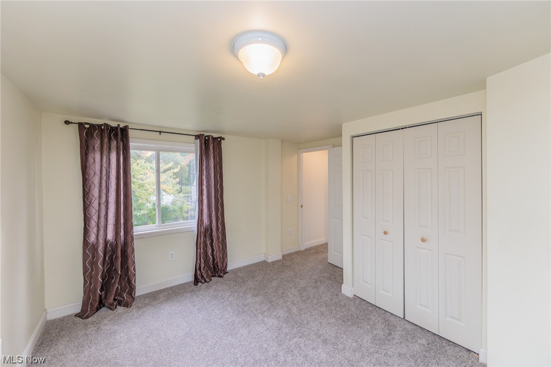 355 Dellwood Road Avon Lake, OH 44012 - Photo 29 of 35 Unfurnished bedroom featuring a closet and light colored carpet