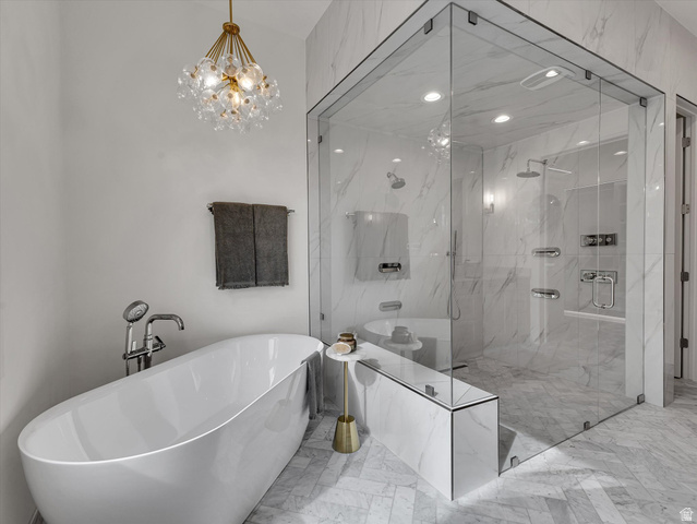 13216 Telemark Lane Draper, UT 84020 - Photo 12 of 41 Full bath with a freestanding tub, light marble finish floors, hanging lights, and a marble finish shower