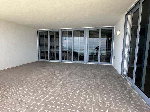 2001 Southeast Sailfish Point Boulevard, Unit 316 Stuart, FL 34996 - Photo 18 of 39 an empty room with windows