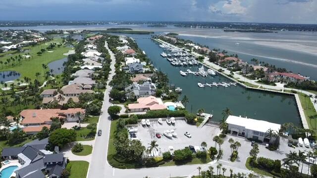 2001 Southeast Sailfish Point Boulevard, Unit 316 Stuart, FL 34996 - Photo 33 of 39 an aerial view of a house with a lake view