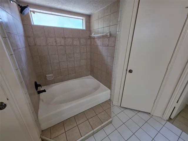 a bathroom with a bathtub
