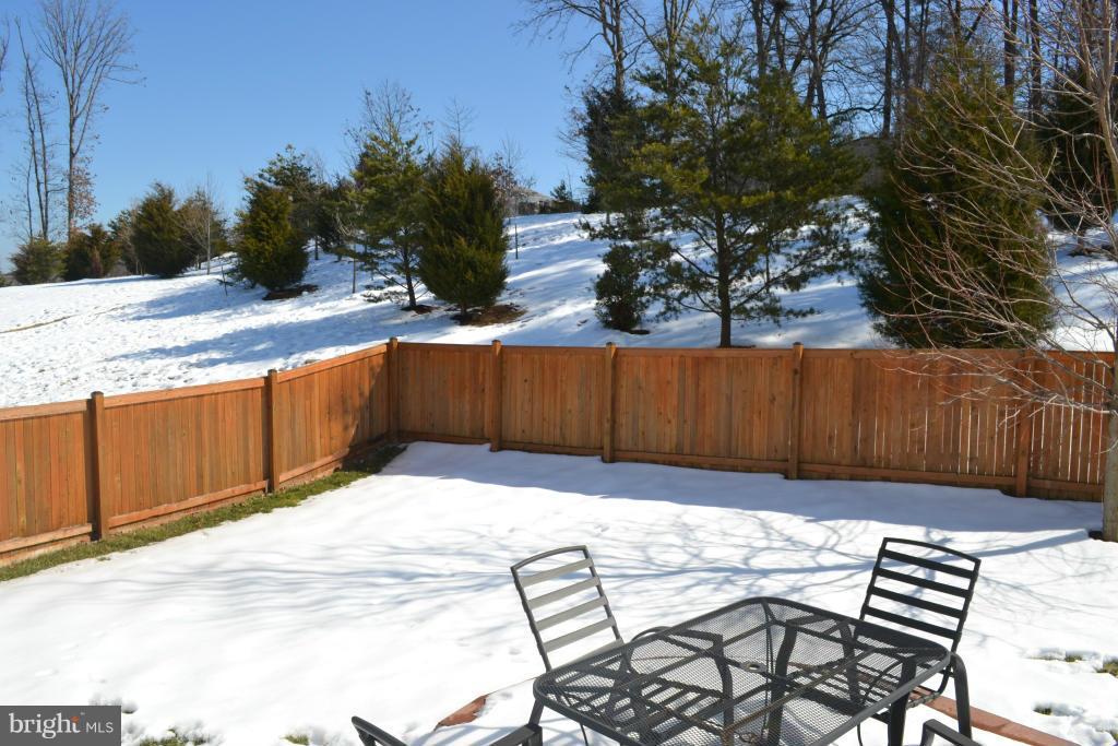 4145 Agency Loop Triangle, VA 22172 - Photo 23 of 24 a view of backyard with wooden fence