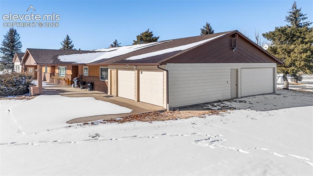24760 Jones Road Calhan, CO 80808 - Photo 17 of 20 3 car garage