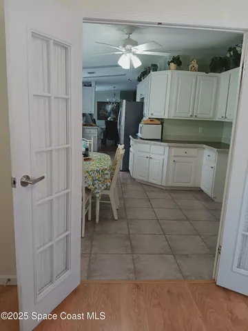 a kitchen with a sink a stove and refrigerator