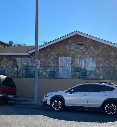 a view of a car parked in front of a house
