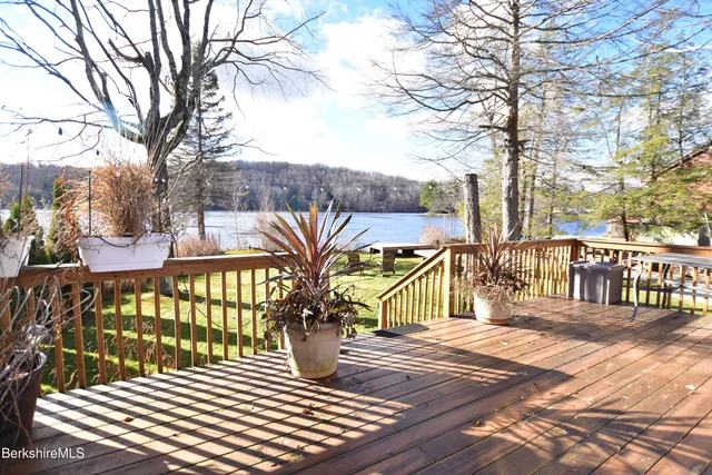 a bedroom with a bed and a closet