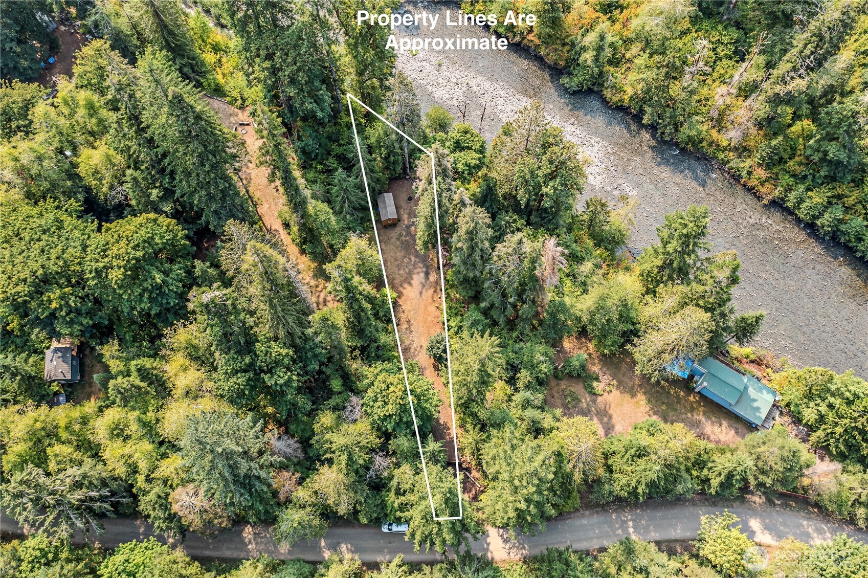 0 North Duckabush Road Brinnon, WA 98320 - Photo 2 of 29 an aerial view of residential house with outdoor space and trees all around