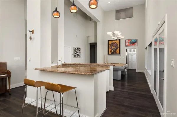 a view of a hallway with seating area