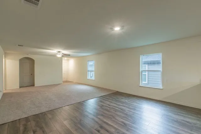 a view of a livingroom and a chandelier