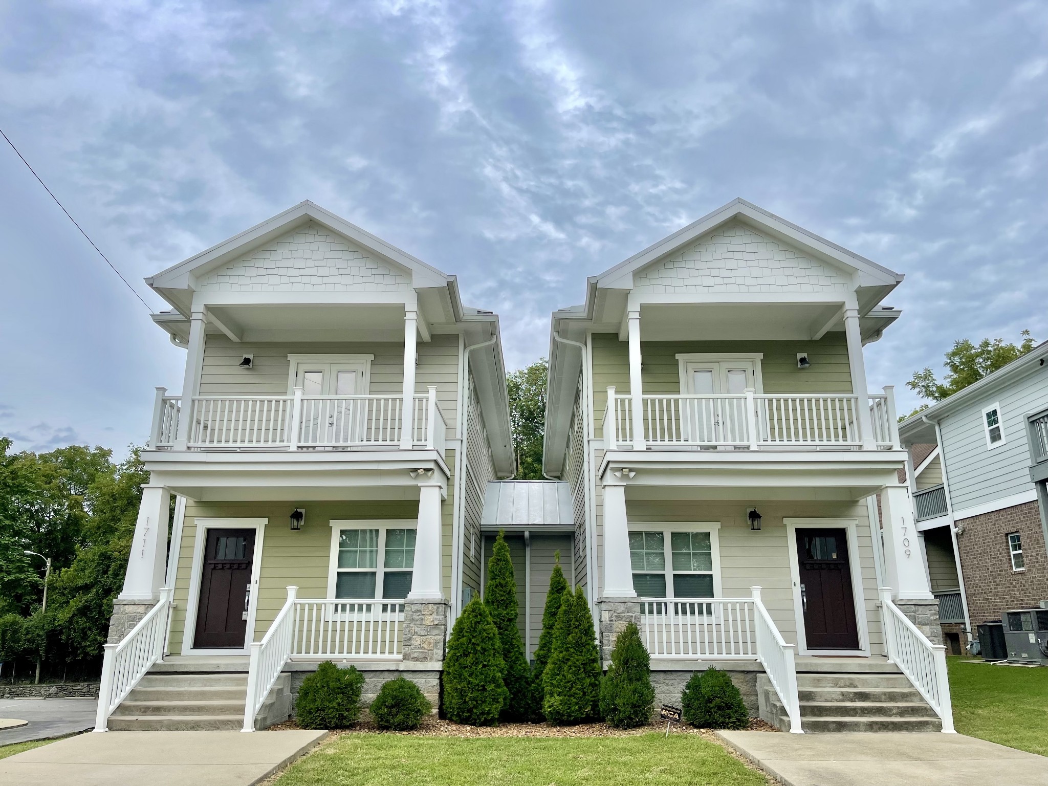 a front view of residential houses
