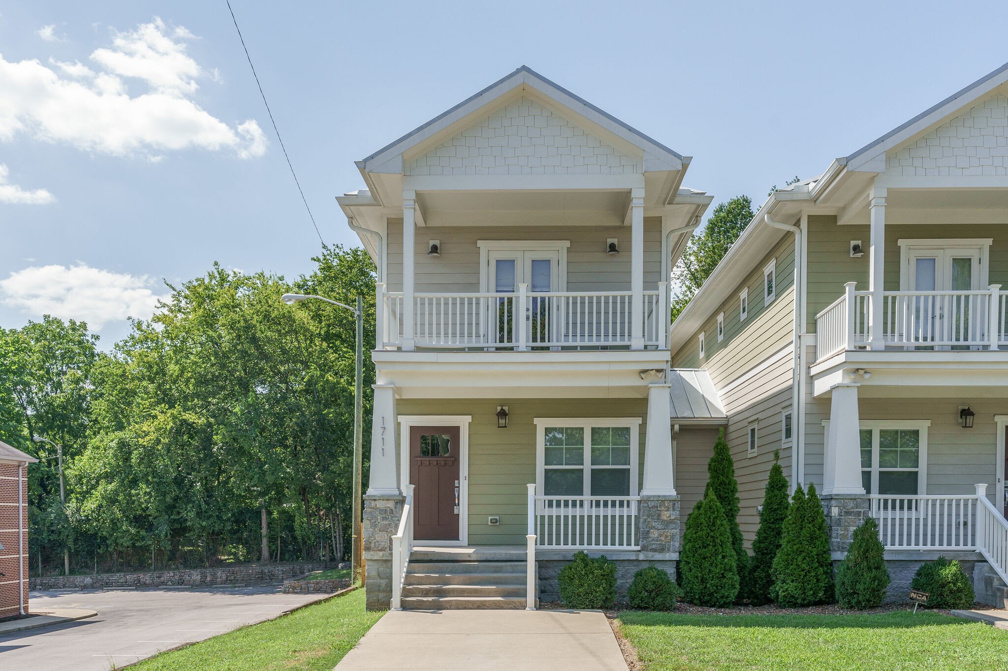 1711 Ridley Boulevard Nashville, TN 37203 - Photo 2 of 49 a front view of a house with garden